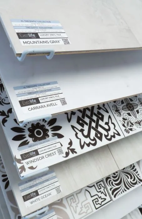 Close-up of luxury vinyl plank from Kadosh Flooring Store showing realistic wood grain and waterproof finish
