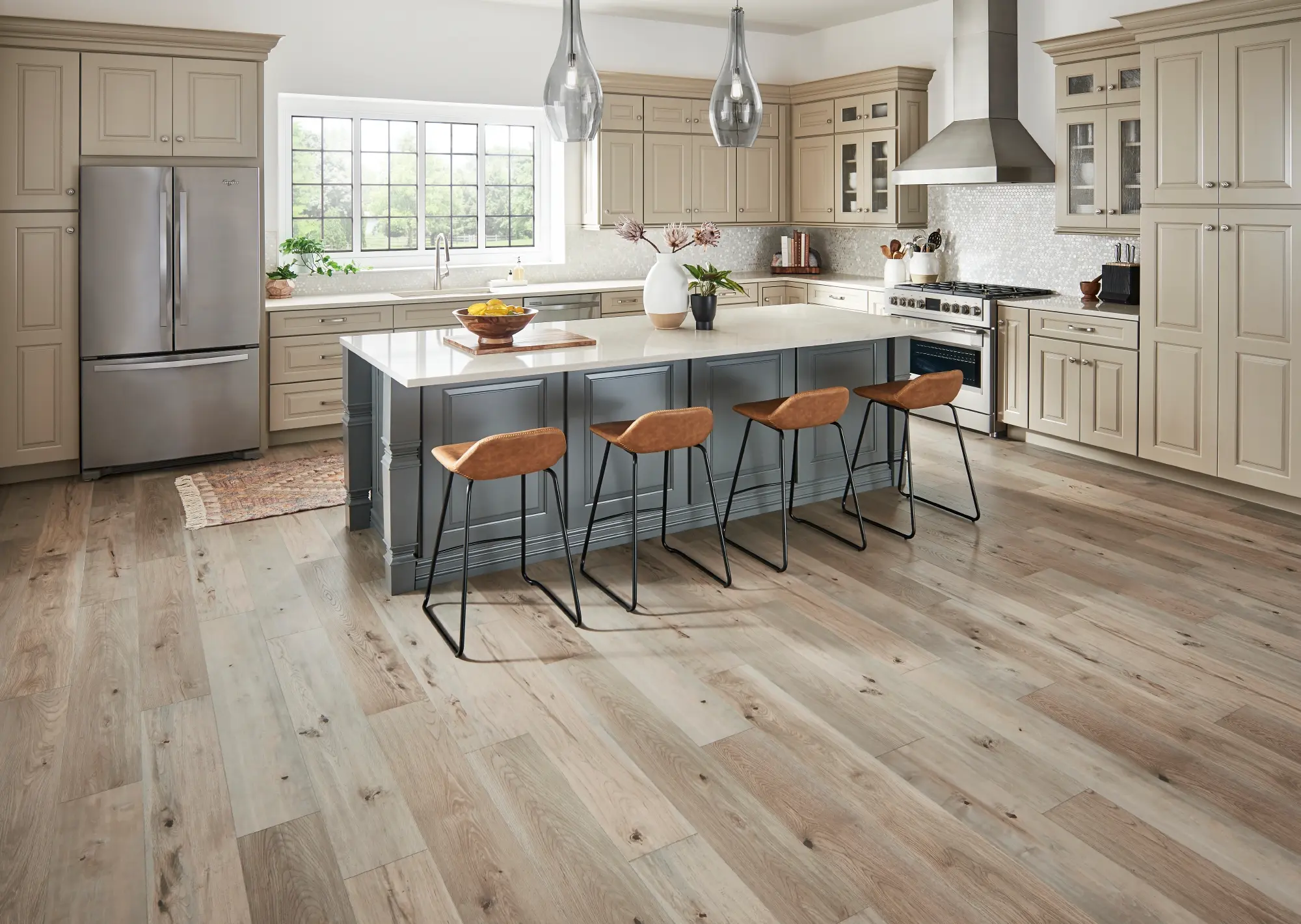 Which Floor Is Right for Me 1 Wide-plank wood-look flooring in a modern kitchen