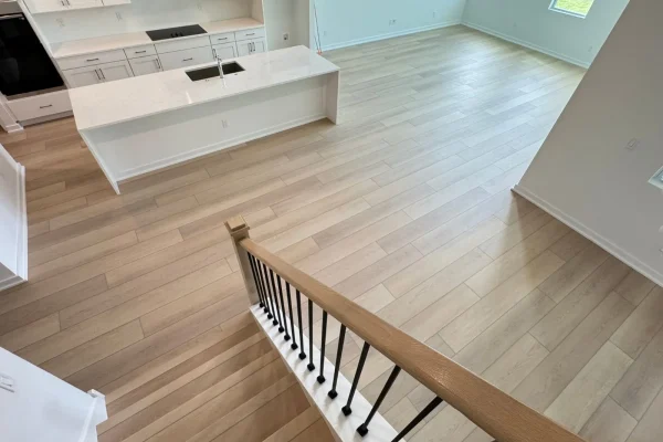 Luxury vinyl flooring mimics hardwood while resisting moisture and scratches.